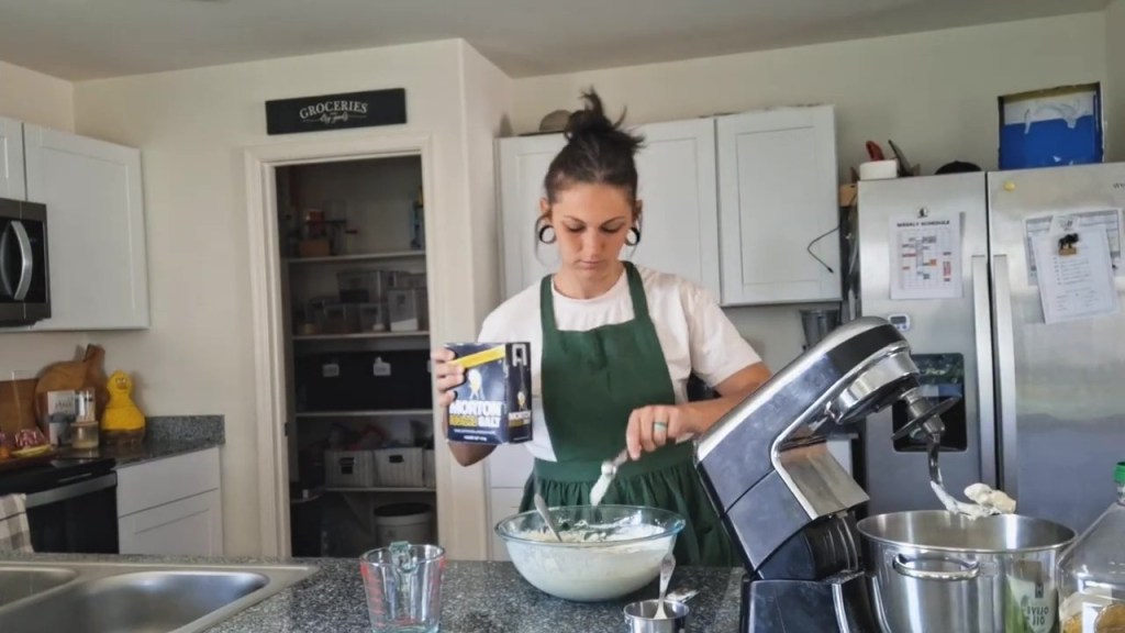 mixing ingredients for homemade pizza dough and home baked bread